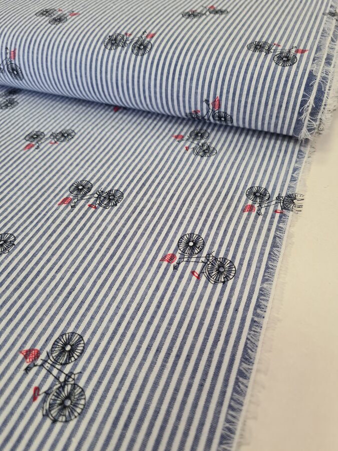 SEERSUCKER cotton with denim blue stripes and bicycle print