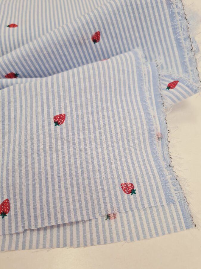 SEERSUCKER cotton with light blue stripes and strawberries print