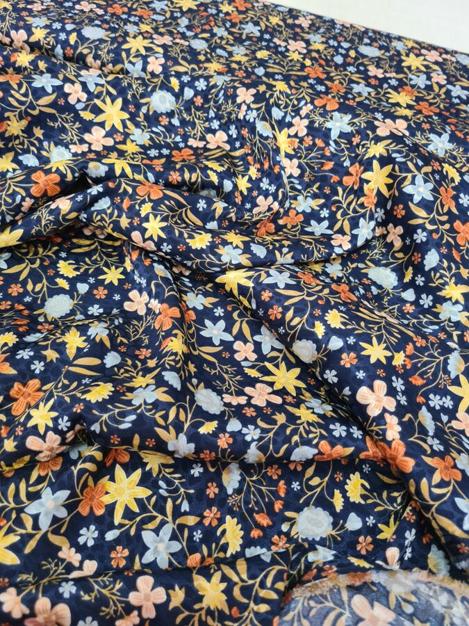 Polyester satin with jacquard texture and floral print (Navy)
