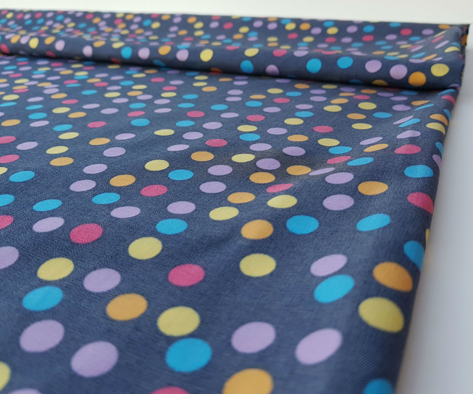 Dark gray fabric with colored polka dots
