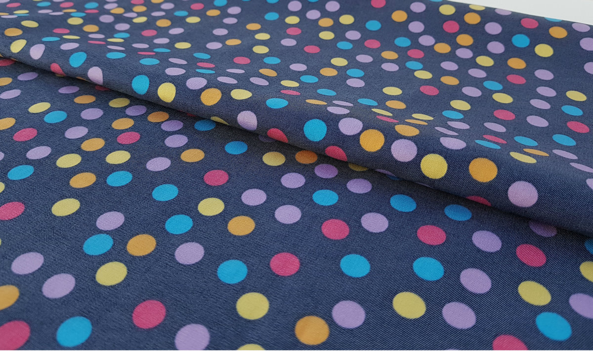 Dark gray fabric with colored polka dots