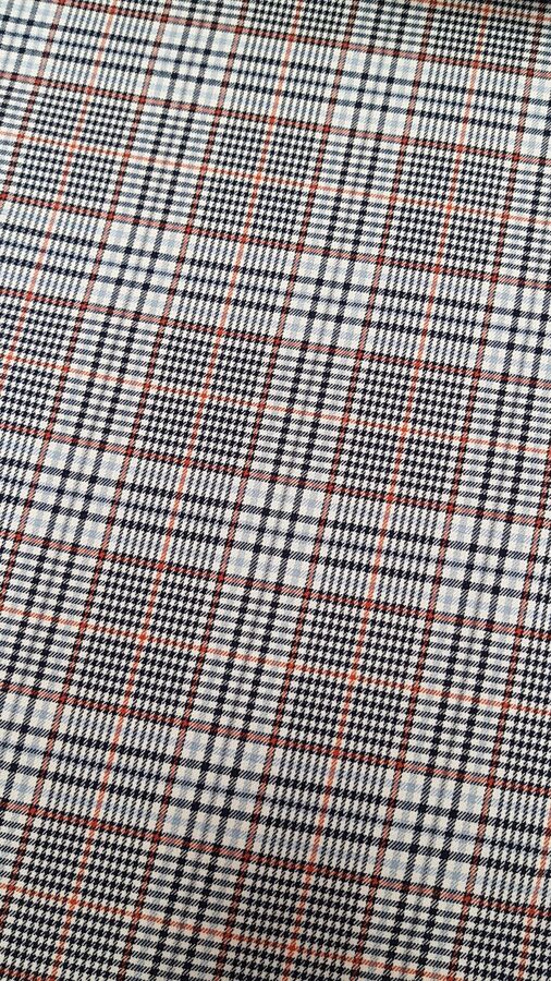 Fabric with check and small houndstooth (Light blue, Orange, black)