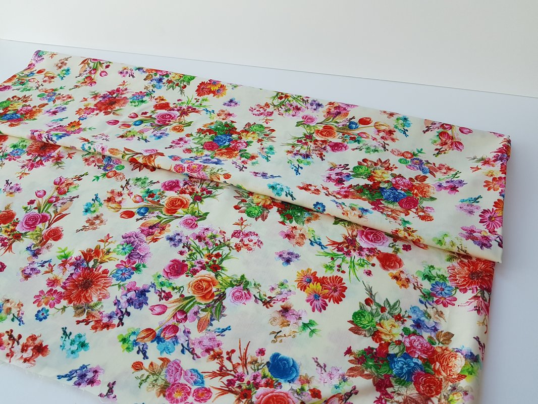 Light viscose  whit colourful flowers.