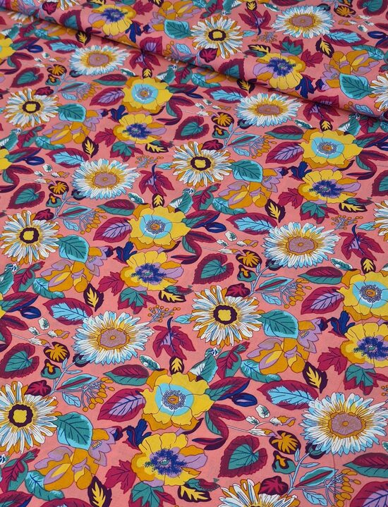 Coral-colored viscose with abstract floral print