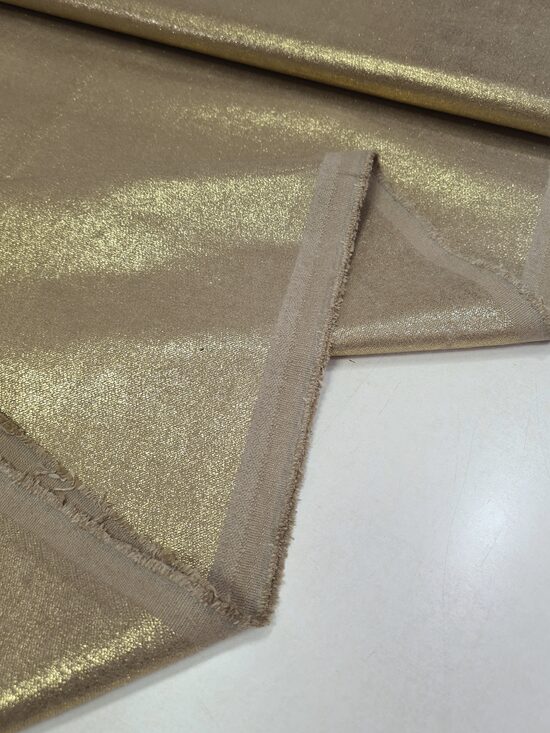 Bēšs džins ar zeltītu pārklājumu 