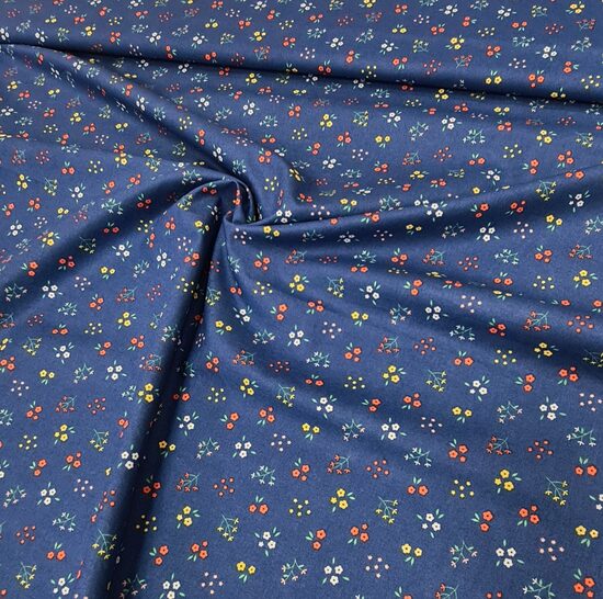 Blue cotton shirt fabric with small floral print