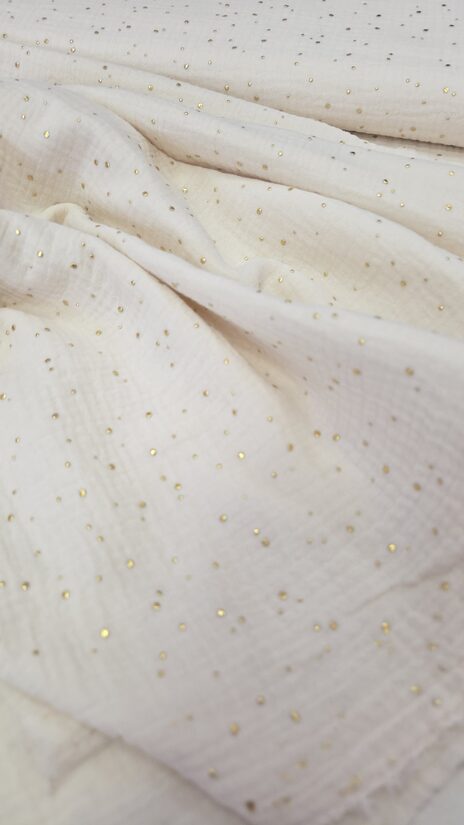 Ecru colour double gauze with golden dots