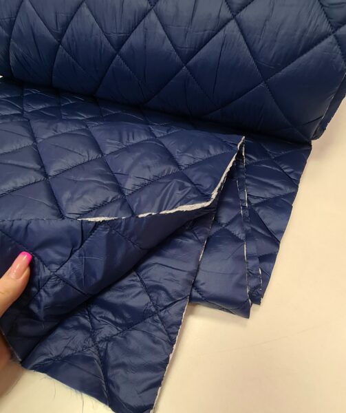 Double-sided quilted outerwear fabric (Denim blue)