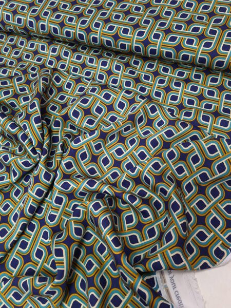 Viscose satin with geometric print (Blue/Ochre/Light petrol green)